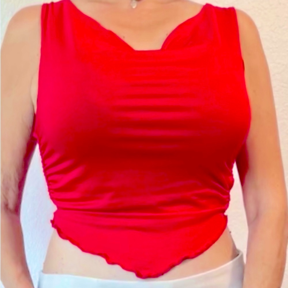 Beautiful sleeveless V neck top. Low cut. Size L
